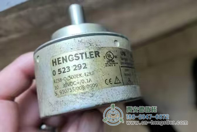 图为一只使用过的亨士乐RI58系列增量编码器照片